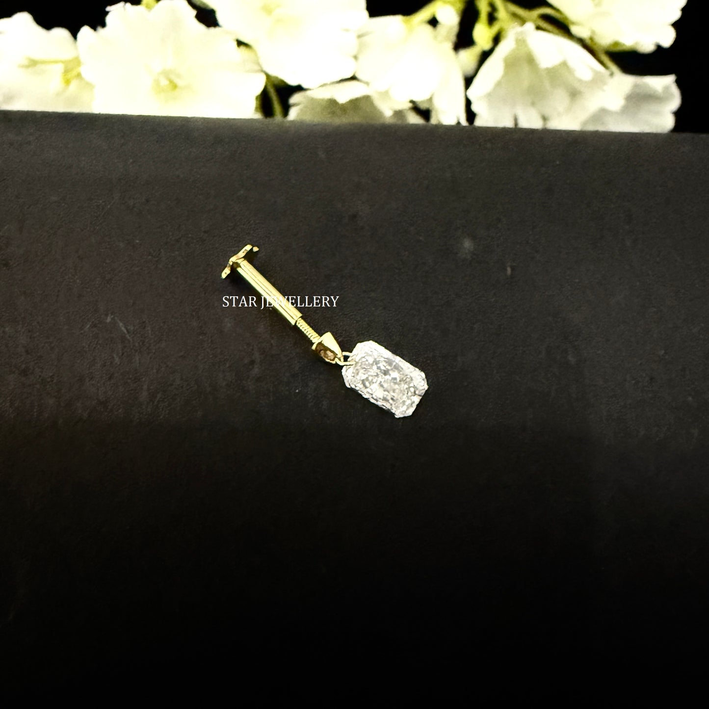 Floating Radiant Diamond Stud Earring