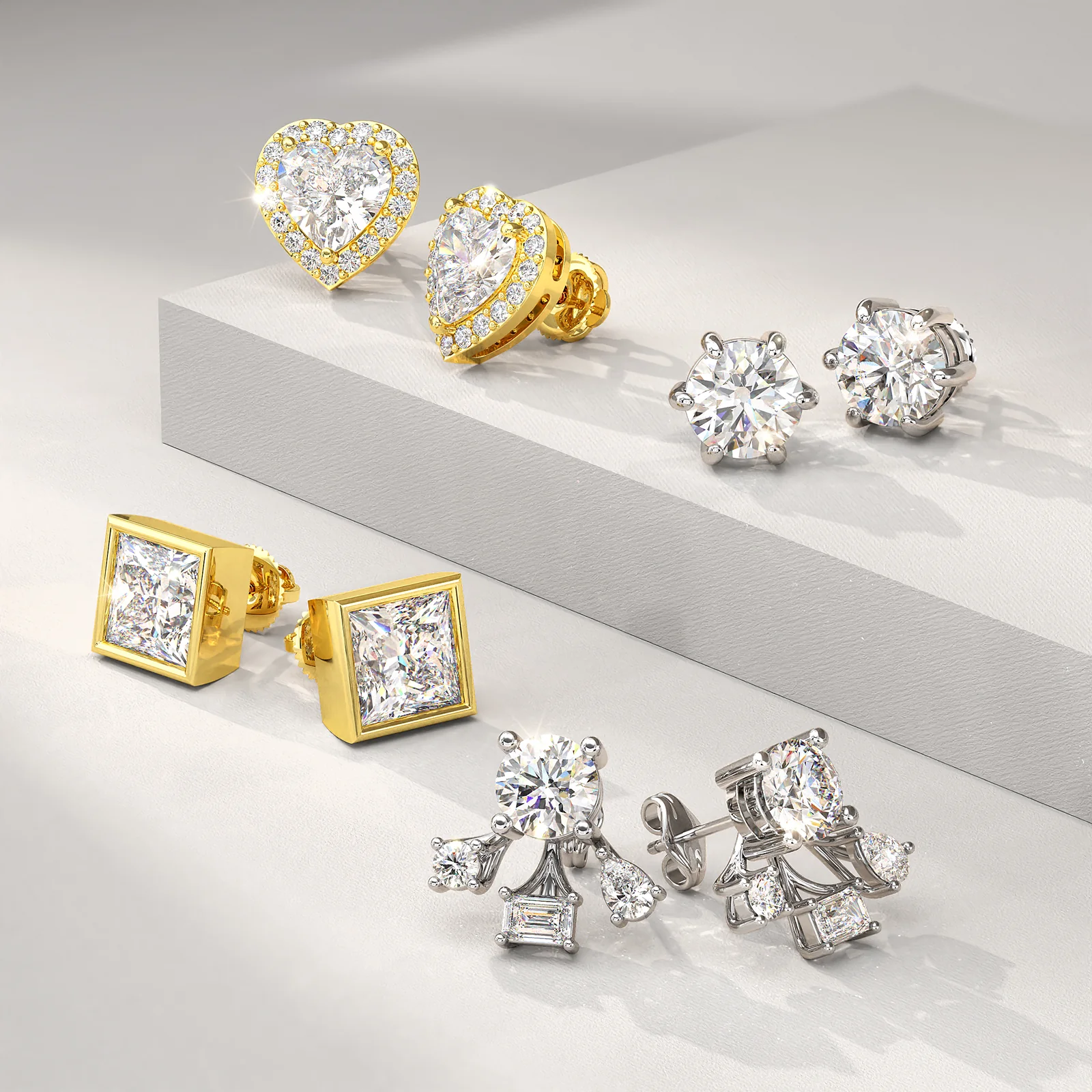 Assorted 14K gold diamond earrings from STAR JEWELRY including hoops, studs, and drop styles