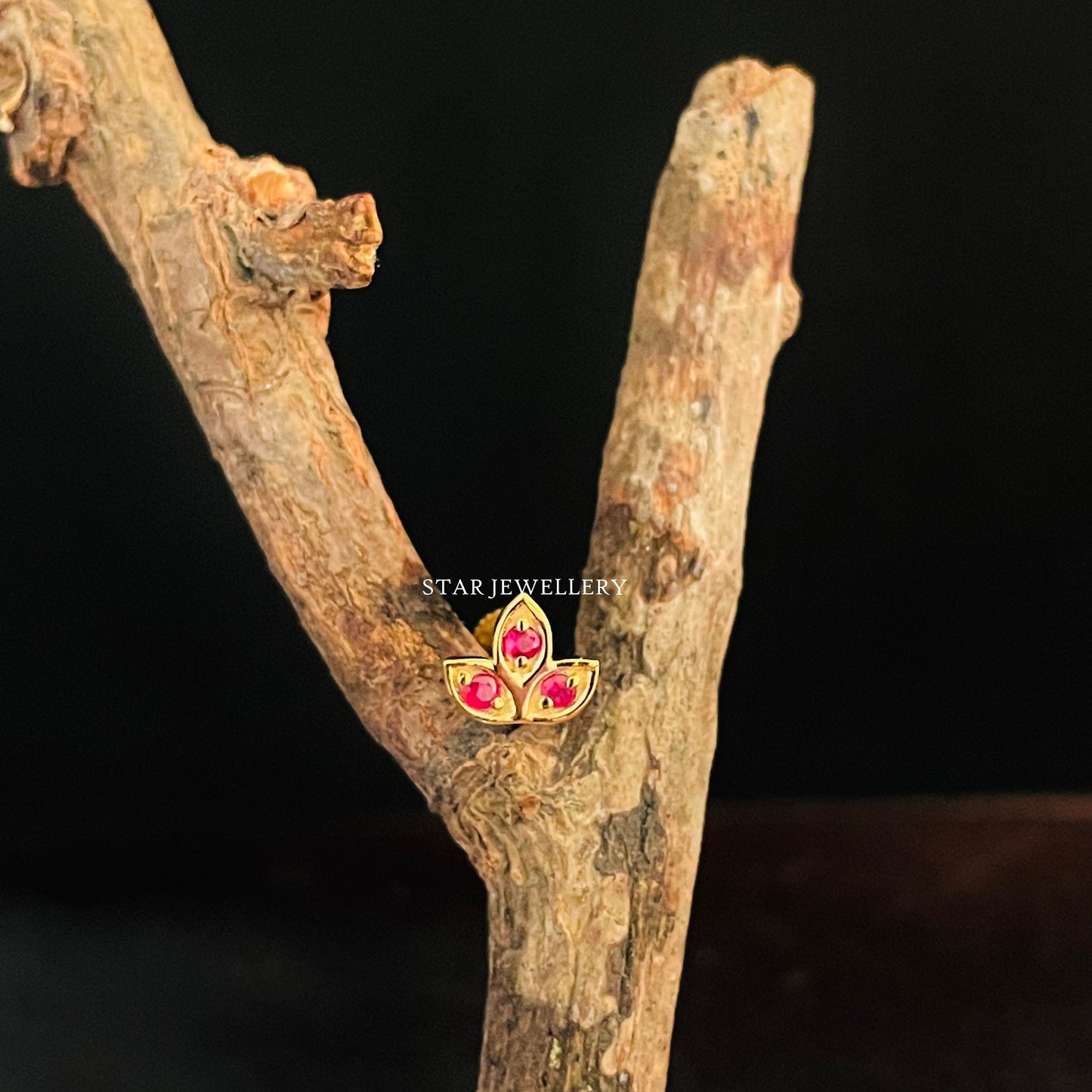 Natural Ruby Lotus Stud Ear Piercing