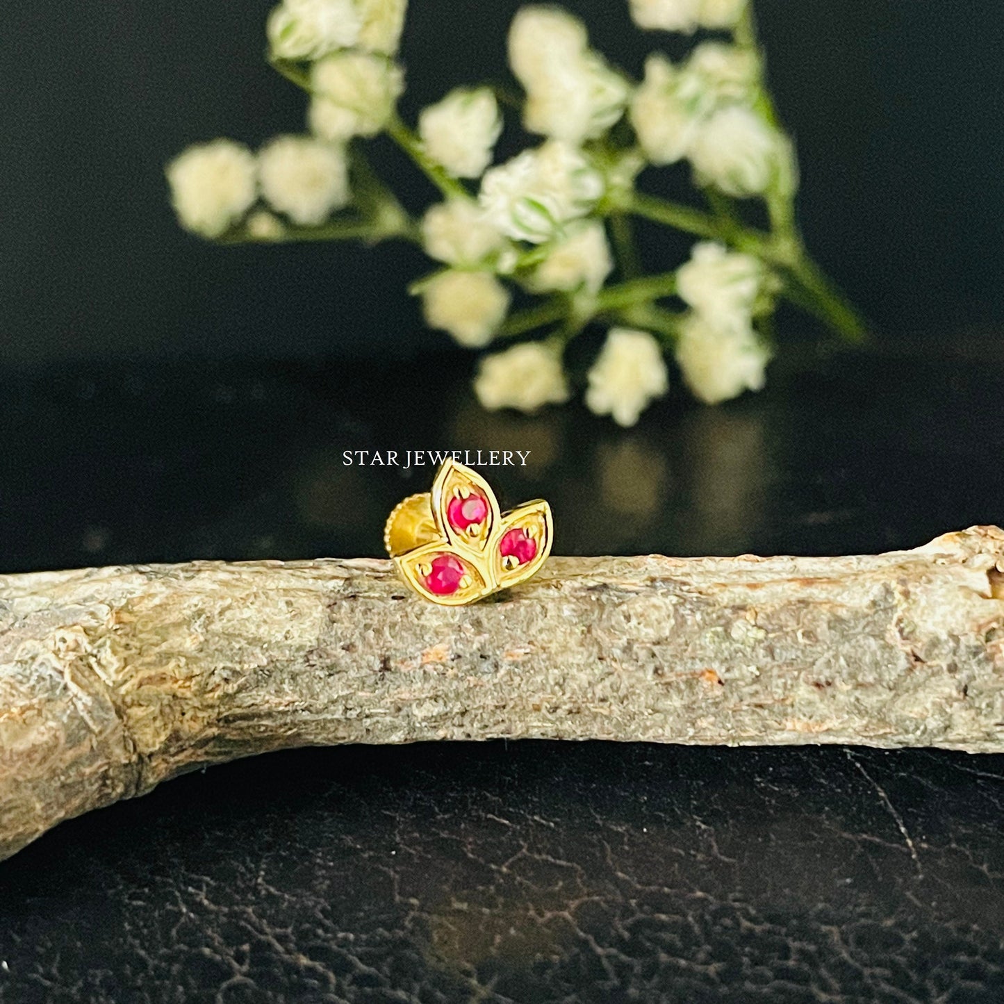 Natural Ruby Lotus Stud Ear Piercing