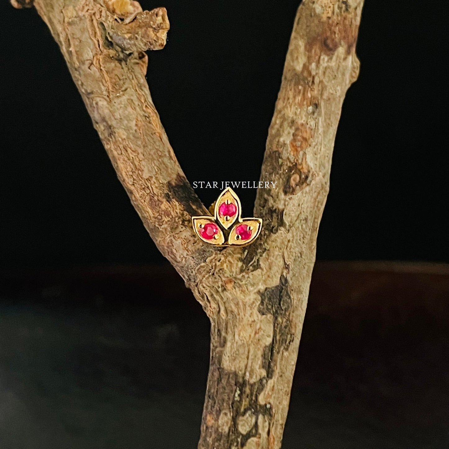 Natural Ruby Lotus Stud Ear Piercing