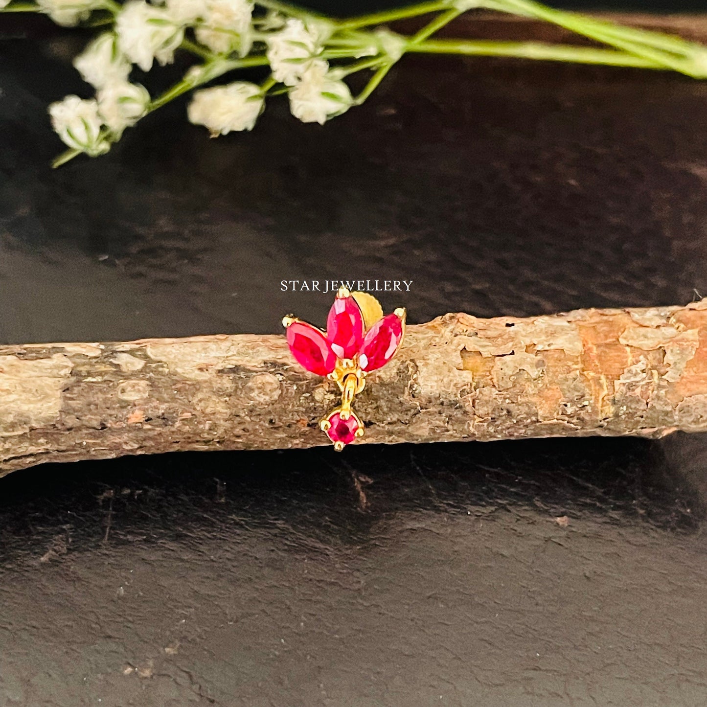 Natural Ruby Lotus Stud Ear Piercing