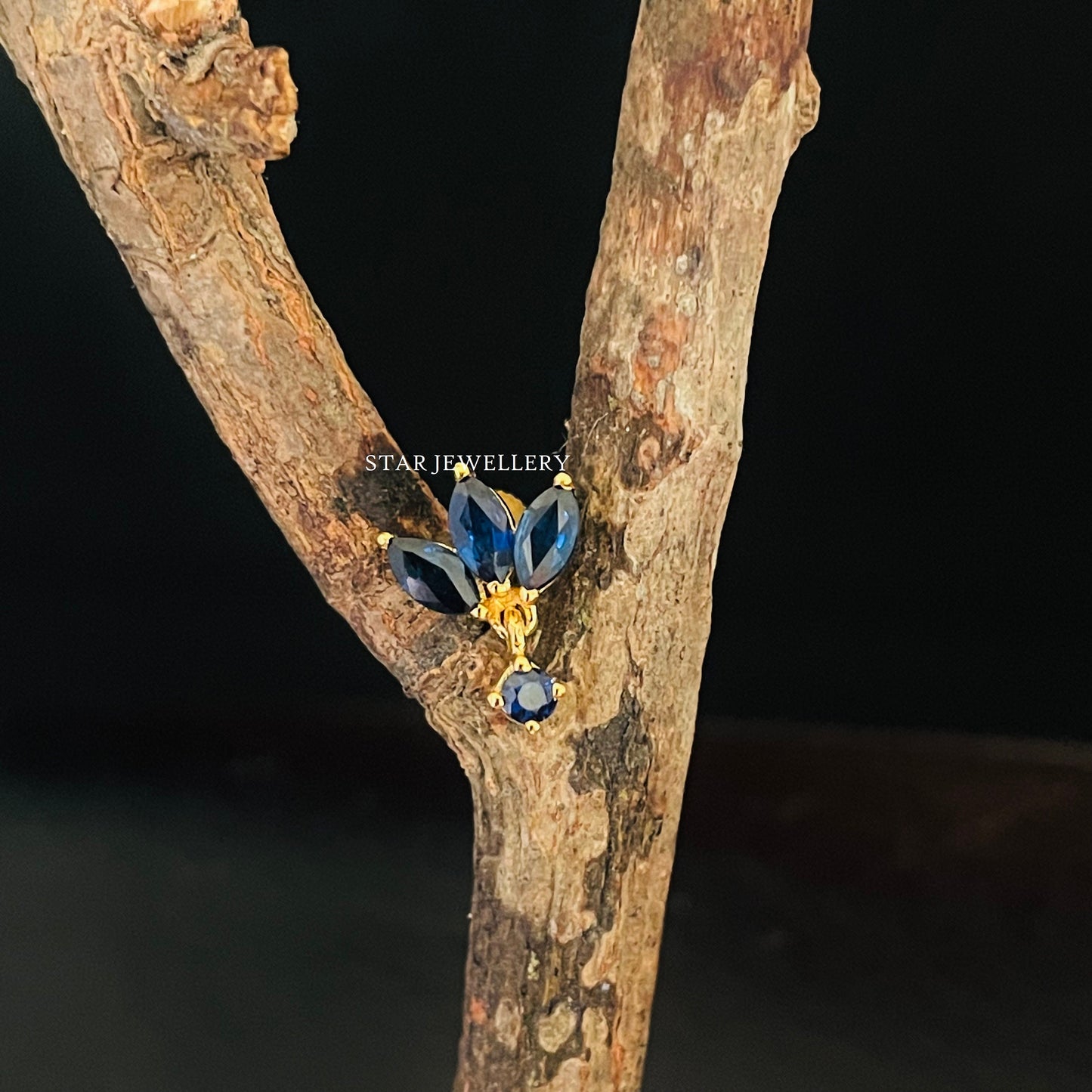 Natural Ruby Lotus Stud Ear Piercing