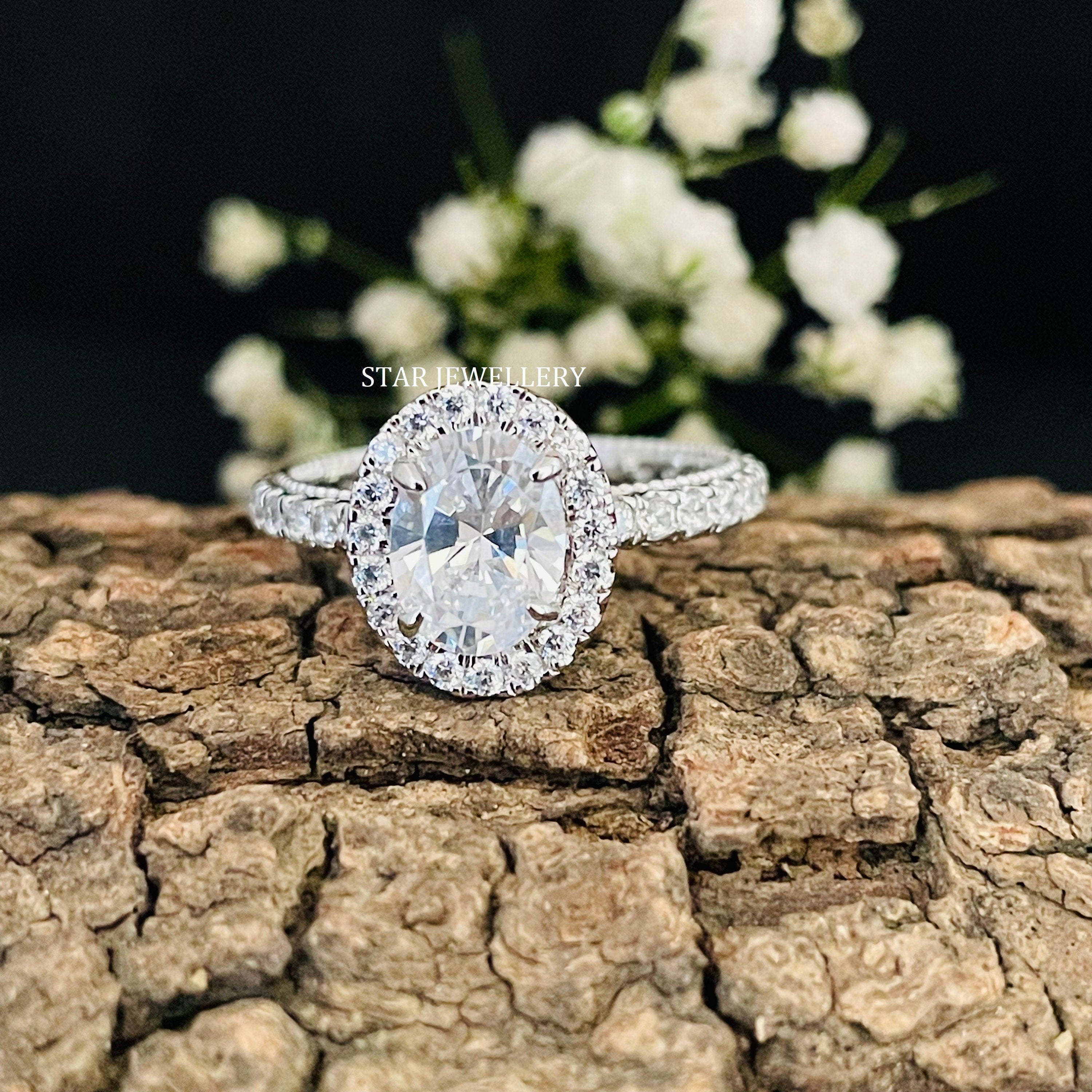 Halo moissanite engagement ring in gold, an example of a ring that requires accurate sizing