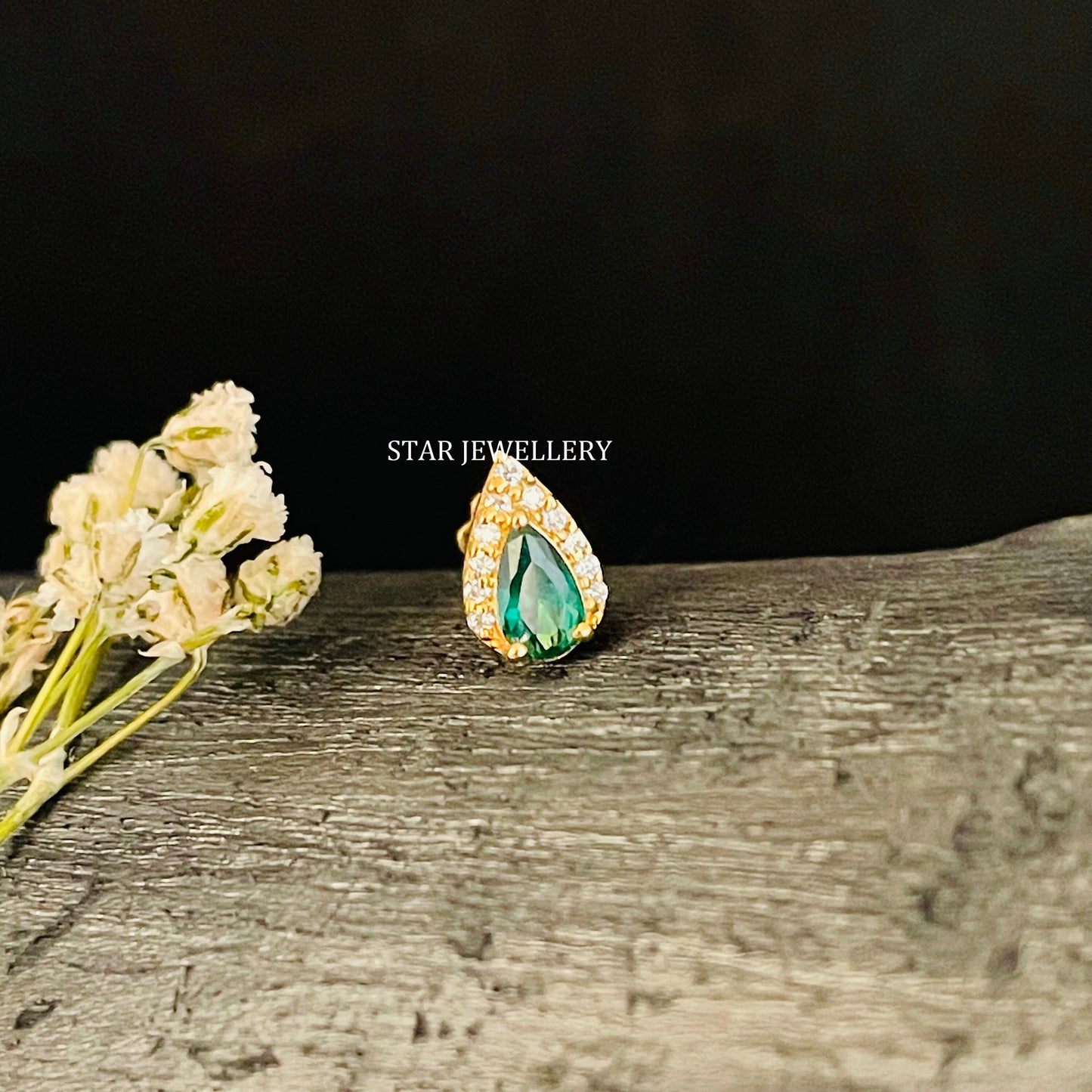 Pear Shape Halo Piercing with Green Emerald