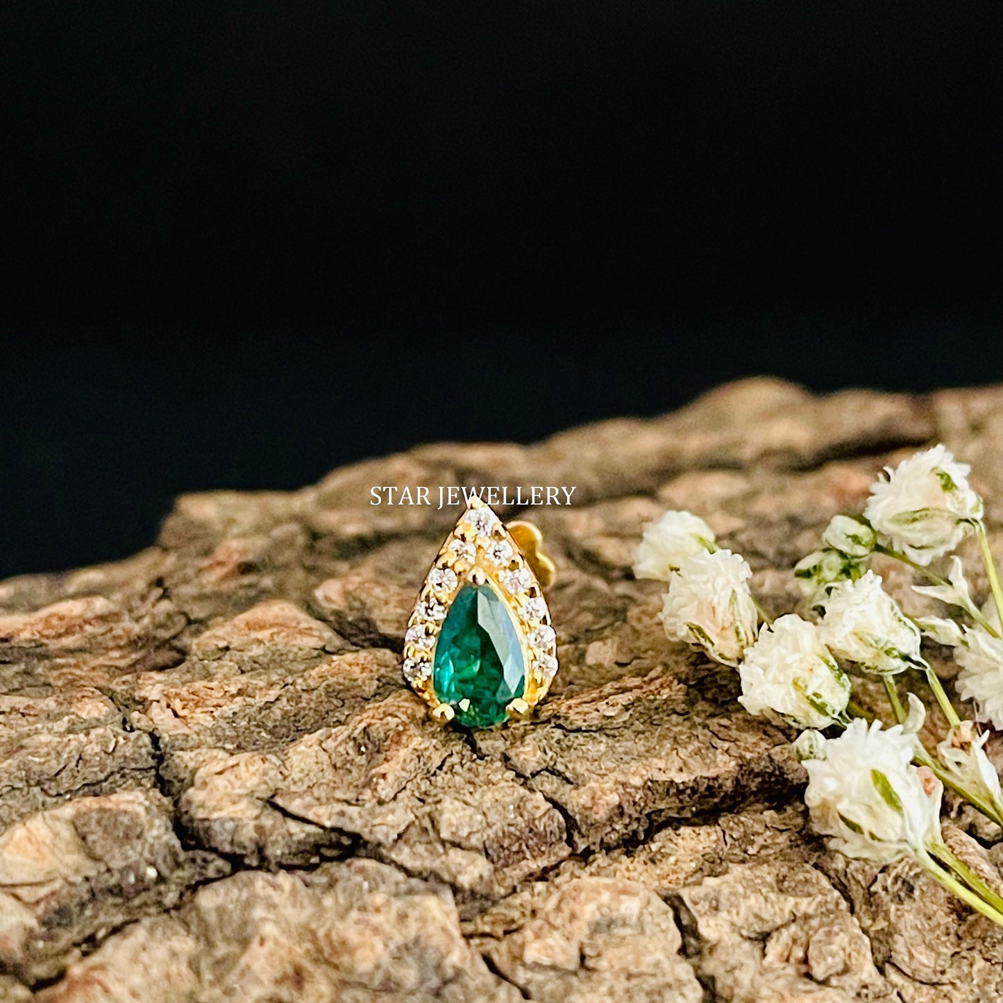 Pear Shape Halo Piercing with Green Emerald