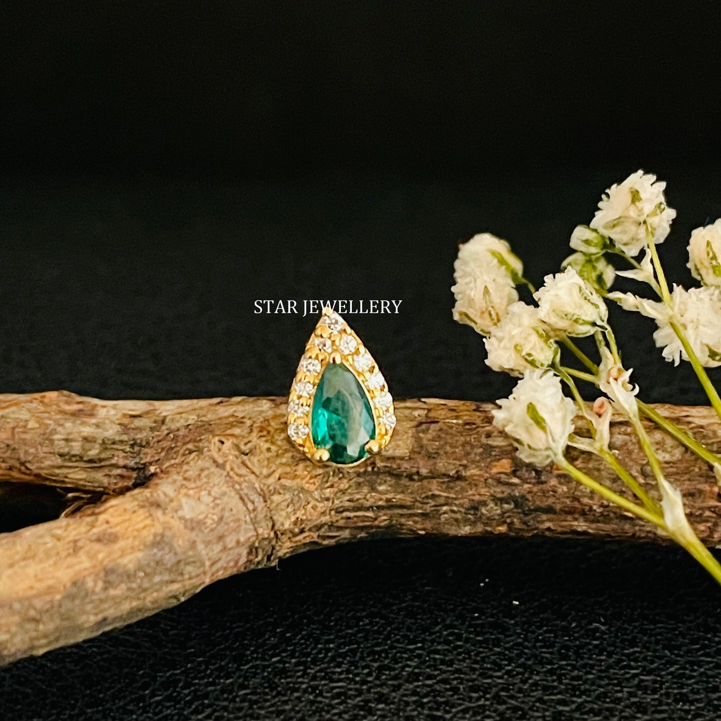 Pear Shape Halo Piercing with Green Emerald