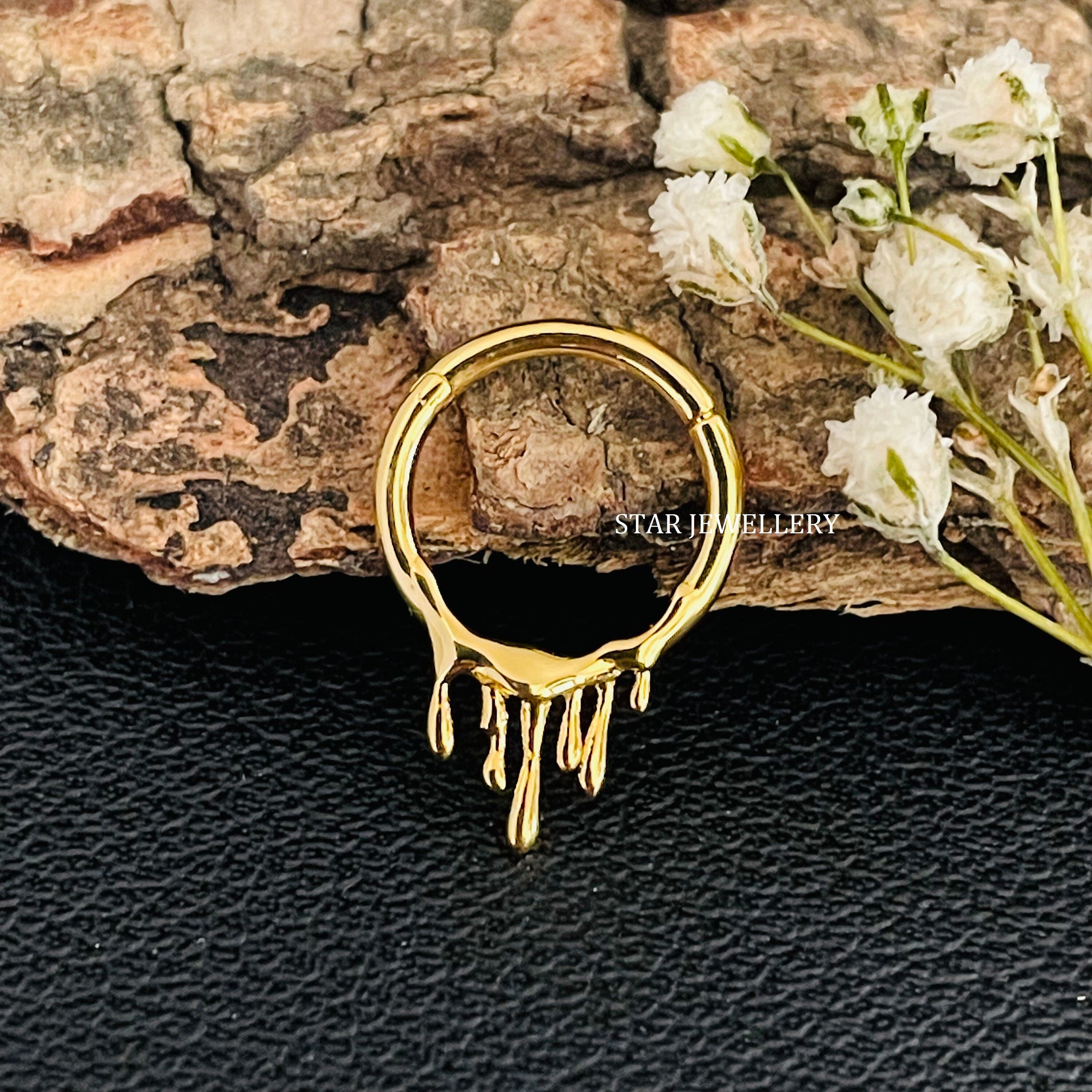 Solid gold lava septum piercing with sculptural texture