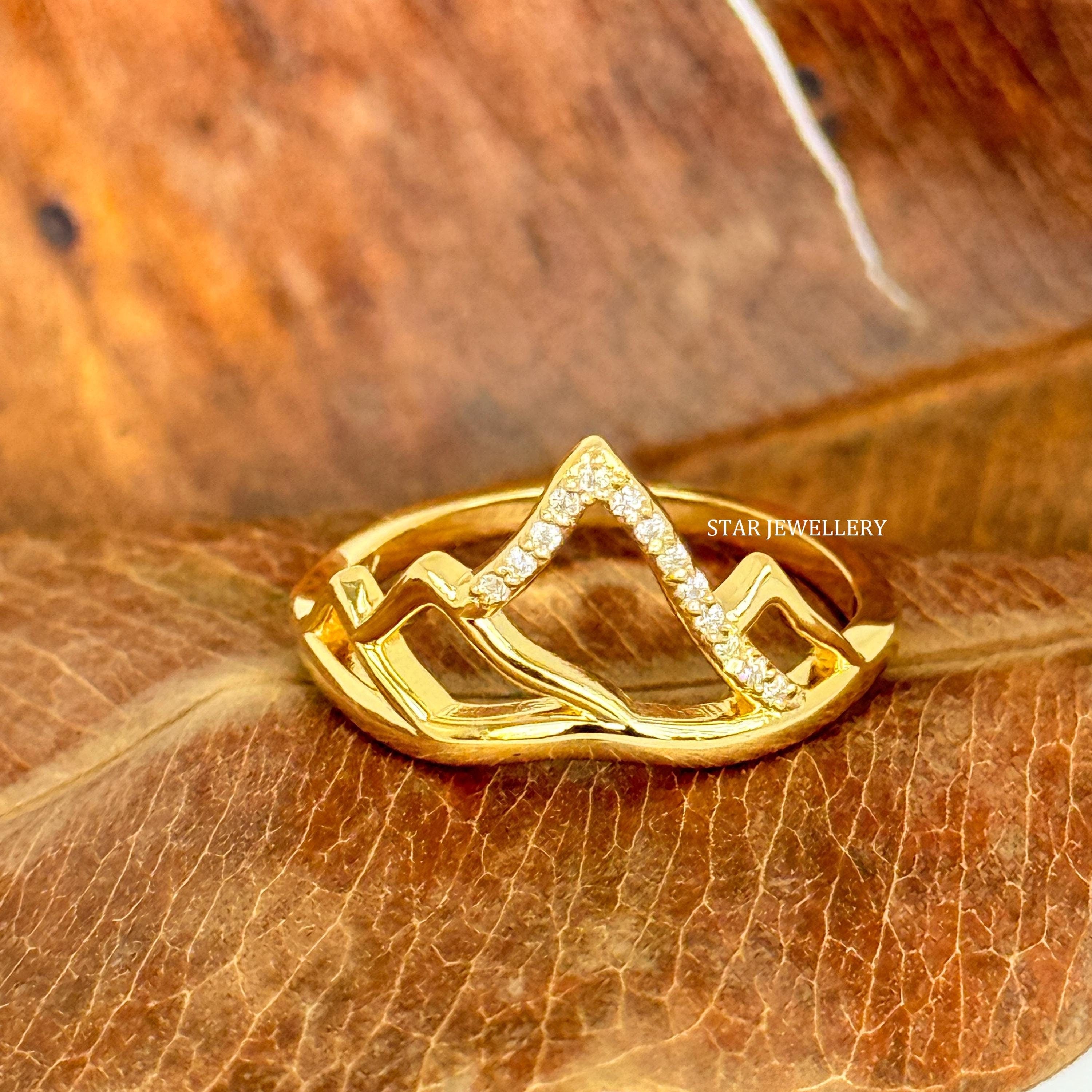 Solid gold mountain diamond ring