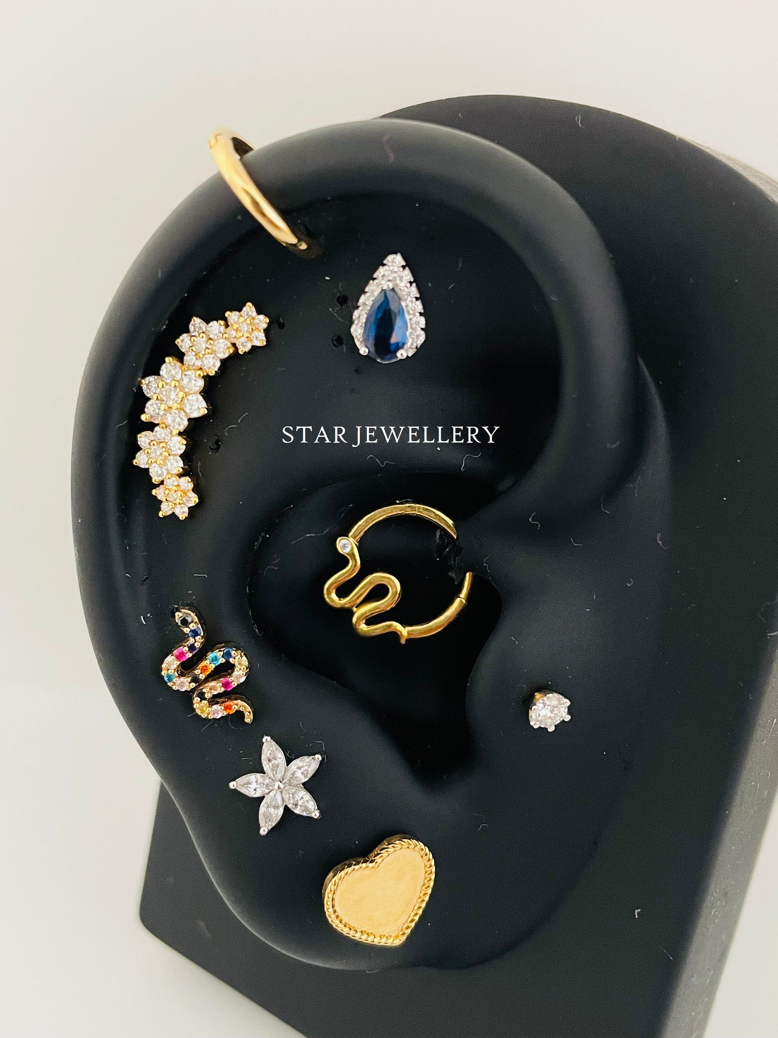 Solid Gold Curved Flower Ear Climber